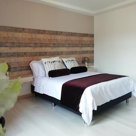 Apartasuite Laureles Cmc Медельин Экстерьер фото
